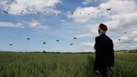 A British D-Day veteran of the Normandy campaign watches a display by 300 multi-national paratroops in Ranville, France June 5, 2014. File pic: Reuters