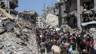 Palestinians inspect the damages after Israeli forces withdrew from a part of Jabalia refugee camp, in the northern Gaza Strip
Pic: Reuters