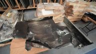 Burnt cladding panel at the Metropolitan Police warehouse in south west London, where exhibits are stored from the investigation into the fire at Grenfell Tower. 
Pic: PA