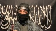 Sameer Anjum posted videos to TikTok in front of a black jihadi flag