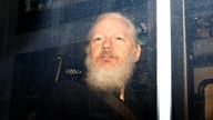 WikiLeaks founder Julian Assange in a police van after being arrested in London in 2019. Pic: Reuters