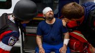 Pic: Reuters. Paramedics help Kharkiv resident Oleksii who was injured during an airstrike on Saturday.