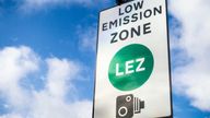 Close-up of a sign letting road users know they are about to enter a Low Emission Zone, with a camera warning symbol. Pic: iStock/georgeclerk