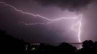 Lightning strikes over Poole harbour in Dorset as thunderstorms swept across parts of south west England after much of the country basked in sunshine and clear skies for the last few days.