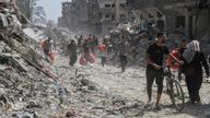 Palestinians inspect the damages after Israeli forces withdrew from a part of Jabalia refugee camp.
Pic: Reuters