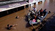 People being rescued in Canoas, Rio Graned do Sul. Pic: Reuters