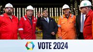 Rishi Sunak speaks with workers, during a visit to Global Energy.
Pic: Reuters