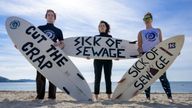 EDITORIAL USE ONLY NOTE LANGUAGE ON PLACARDS Lucy Luck, Evelyn Hull and Emily van de Geer take part in a protest by Surfers Against Sewage (SAS), in Falmouth, who are calling for an end to the sewage discharges plaguing the UK&#39;s rivers and seas. Picture date: Saturday May 18, 2024.

