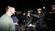 Demonstrators face off with police on the UCLA campus Thursday, May 2, 2024, in Los Angeles. (AP Photo/Ryan Sun)