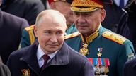 Vladimir Putin and Sergei Shoigu after a Victory Day military parade in Moscow on 9 May. Pic: AP
