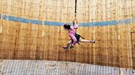 Researchers tied people to bungee cords to simulate the moon&#39;s gravity and asked them to run around a rented &#39;wall of death&#39;. Pic: University of Milan