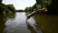 EMBARGOED TO 0001 MONDAY MAY 13 File photo dated 30/07/14 of a swimmer diving into the water at the mixed bathing ponds in Hampstead Heath, London. A record number of wild swimming spots have been designated as bathing sites in England ahead of the summer months, the Government has confirmed. The Environment Agency will immediately start monitoring the water quality at 27 sites which the Government had proposed as new bathing sites during a consultation earlier this year. Issue date: Monday May 