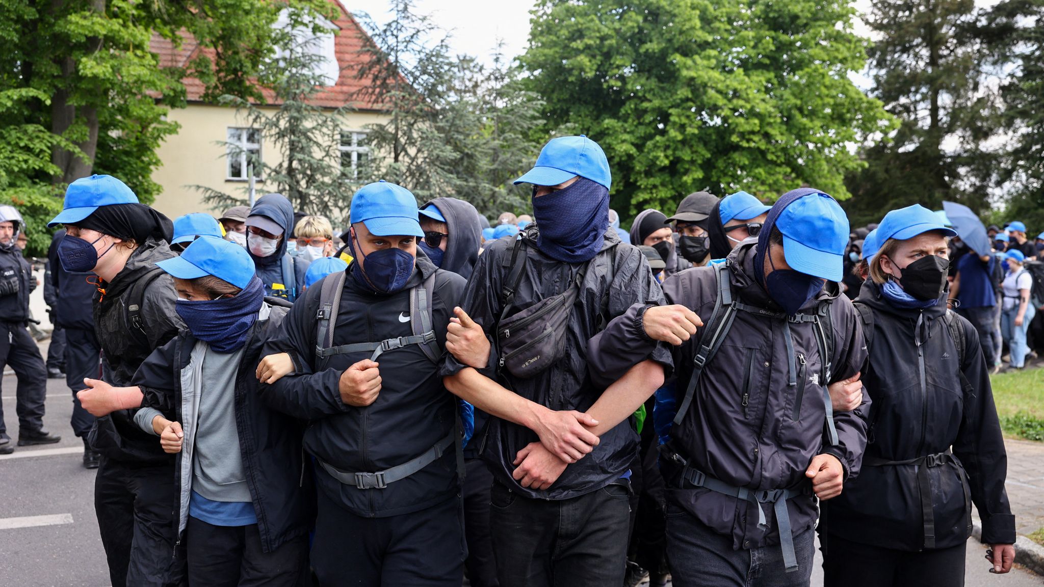 Hundreds of protesters attempt to storm Tesla factory near Berlin ...