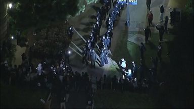 Police arrive on UCLA campus as pro-Palestinian protesters remain despite orders to leave
