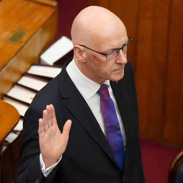 John Swinney takes the oath as he is sworn in as First Minister of Scotland and Keeper of the Scottish Seal, at the Court of Session in Edinburgh. Picture date: Wednesday May 8, 2024.