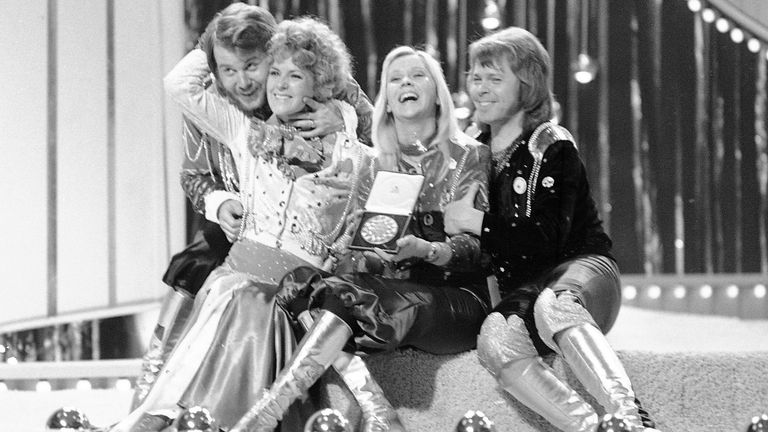 FILE - Swedish pop group ABBA celebrate winning the 1974 Eurovision Song Contest on stage at the Brighton Dome in England with their song 