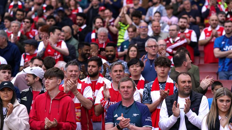 Fans applaud in memory of 14-year-old Daniel Anjorin. Pic: PA/Adam Davy