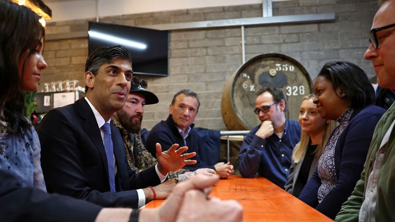 Rishi Sunak speaks with brewery workers at Vale of Glamorgan Brewery in Barry, Wales