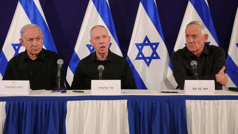 From left: Israeli Prime Minister Benjamin Netanyahu, with Defense Minister Yoav Gallant and Cabinet minister Benny Gantz at a news conference in October 2023