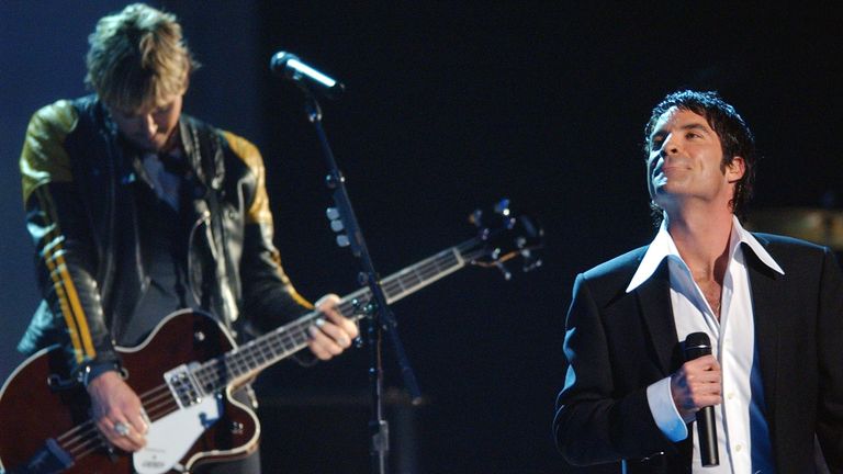 Colin, left, and Pat Monahan perform during the 44th annual Grammy Awards in 2022. Photo: AP