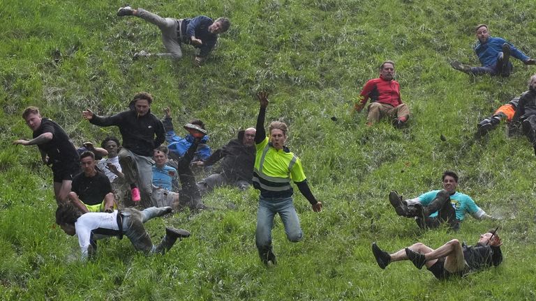 Pic: PA
Participants take part in the annual cheese rolling at Cooper&#39;s Hill in Brockworth, Gloucestershire. Picture date: Monday May 27, 2024.