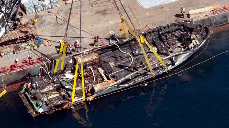 FILE - The burned hull of the dive boat Conception is brought to the surface by a salvage team off Santa Cruz Island, Calif., on Sept. 12, 2019. A federal jury on Monday, Nov. 6, 2023, found scuba dive boat captain Jerry Boylan was criminally negligent in the deaths of 34 people killed in a fire aboard the vessel in 2019, the deadliest maritime disaster in recent U.S. history. (Brian van der Brug/Los Angeles Times via AP, File)