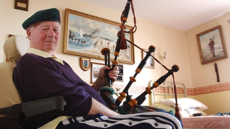Piper Bill Millin at his home in Dawlish, Devon, with bagpipes (NOT the pipes he blew on the beach) in 2004