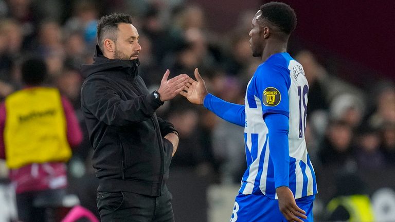 De Zerbi shakes hands with Brighton forward Danny Welbeck. Pic: AP