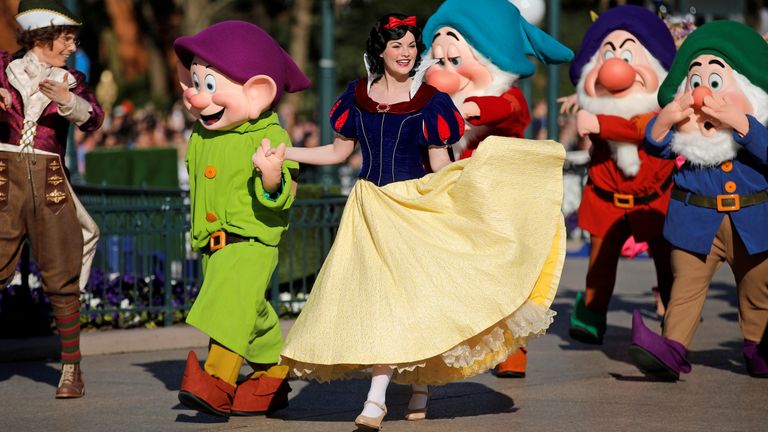 Snow White with some of the seven dwarfs.  Photo: Reuters
