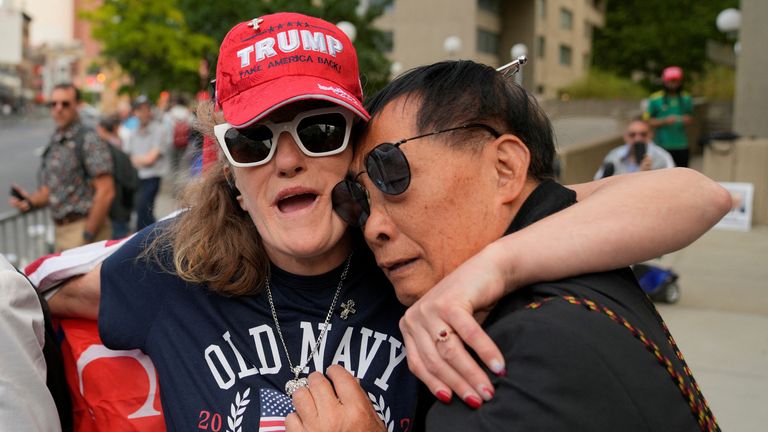 Trump supporters outside court. Pic: Reuters