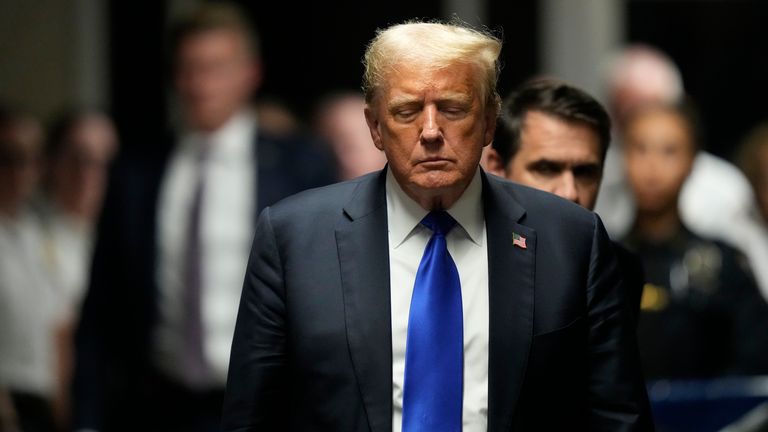 Former President Donald Trump walks to make comments to members of the media after being found guilty on 34 felony counts of falsifying business records in the first degree at Manhattan Criminal Court, Thursday, May 30, 2024, in New York. Donald Trump became the first former president to be convicted of felony crimes as a New York jury found him guilty of 34 felony counts of falsifying business records in a scheme to illegally influence the 2016 election through hush money payments to a porn actor who said the two had sex. (AP Photo/Seth Wenig, Pool)
