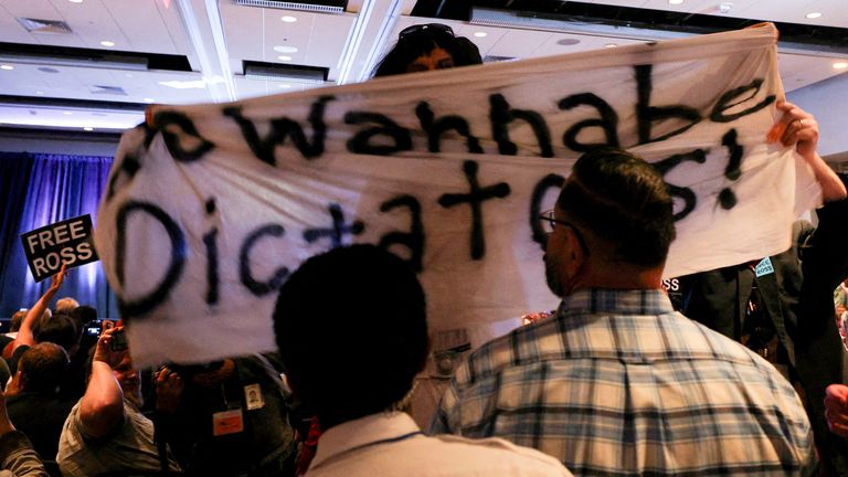 A &#39;no wannabe dictators&#39; banner at the Libertarian convention. Pic: Reuters