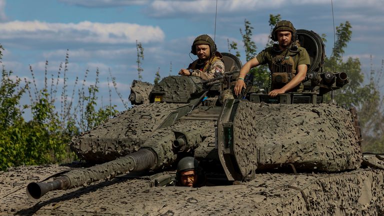 Pic: Reuters
Ukrainian servicemen of the 21st Separate Mechanized Brigade ride along a road in a Swedish made CV90 infantry fighting vehicle, amid Russia's attack on Ukraine, near a front line in Donetsk region, Ukraine May 12, 2024. REUTERS/Valentyn Ogirenko