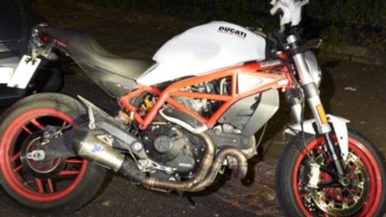 At a news conference near the scene on Friday, police revealed the bike the offender used in the attack on Dalston Kingsland Road is a Ducati Monster with a white body, red chassis, and red wheels. Pic: Met Police

