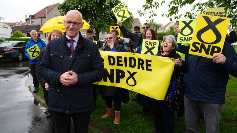 SNP Leader John Swinney canvassing with SNP activists in Grierson Square, Edinburgh, while on the General Election campaign trail. Picture date: Tuesday May 28, 2024.