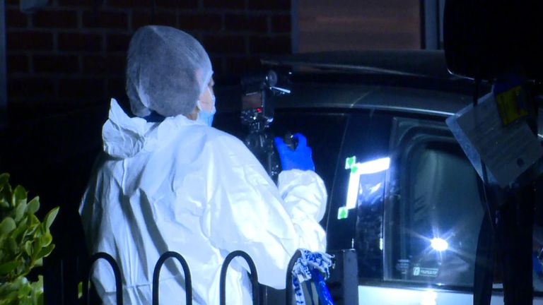Forensic teams at the scene of a police crossbow shooting in High Wycombe, Bucks.