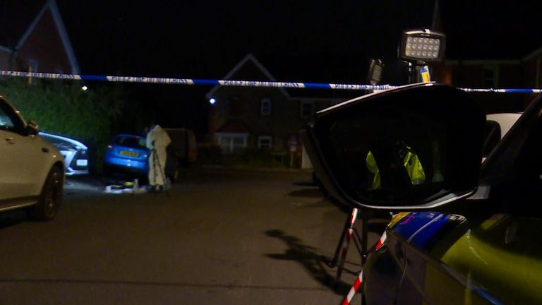 Forensic teams at the scene of a police crossbow shooting in High Wycombe, Bucks.