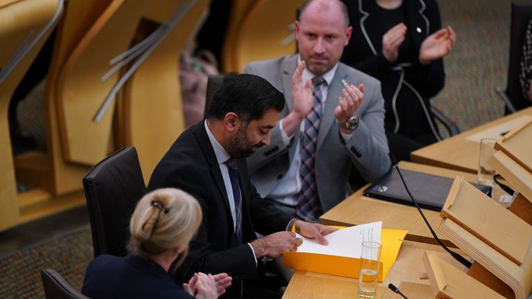 Humza Yousaf is clapped after his final speech to the Scottish Parliament as outgoing First Minister, at the Scottish Parliament in Edinburgh. Picture date: Tuesday May 7, 2024.