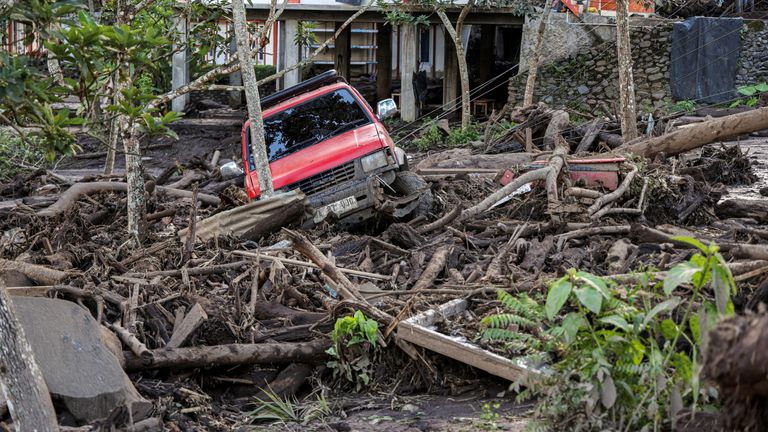 MANDATORY CREDIT.
A damaged car is seen in an area affected by heavy rain brought flash floods and landslides in Tanah Datar, West Sumatra province, Indonesia, May 12, 2024, in this photo taken by Antara Foto. Antara Foto/Sigit Putra/via REUTERS ATTENTION EDITORS - THIS IMAGE HAS BEEN SUPPLIED BY A THIRD PARTY. MANDATORY CREDIT. INDONESIA OUT. NO COMMERCIAL OR EDITORIAL SALES IN INDONESIA.