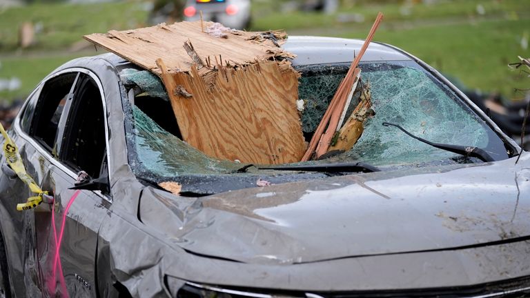 Photo: AP A damaged car rests on a street after a tornado Tuesday, May 21, 2024, in Greenfield, Iowa.  (AP Photo/Charlie Neibergall)