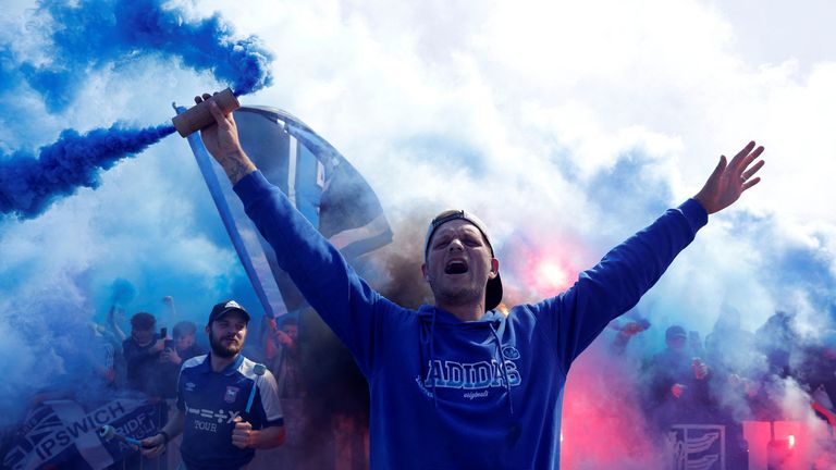 Ipswich fans with flares outside the stadium before the match.  Photo: Reuters