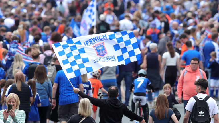 Ipswich Town fans ahead of an open-top bus parade.
Pic: PA