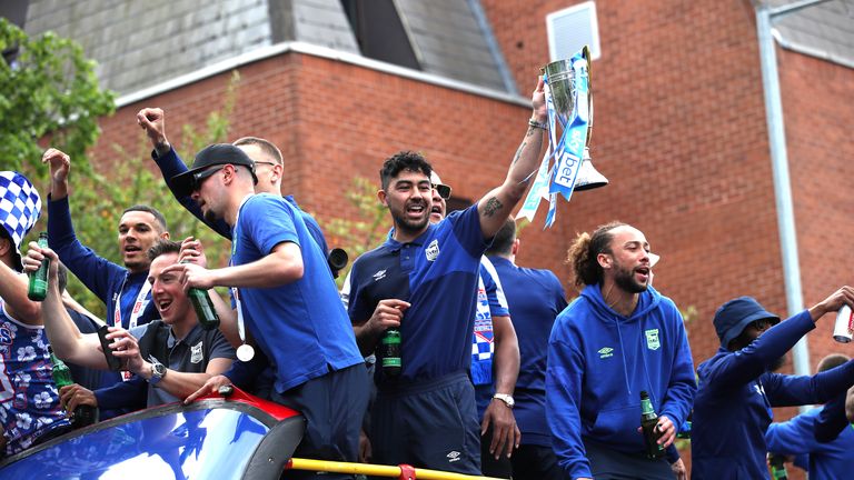 Ipswich Town's Massimo Luongo lifts the Sky Bet Championship trophy during an open-top bus parade.  Peak PA