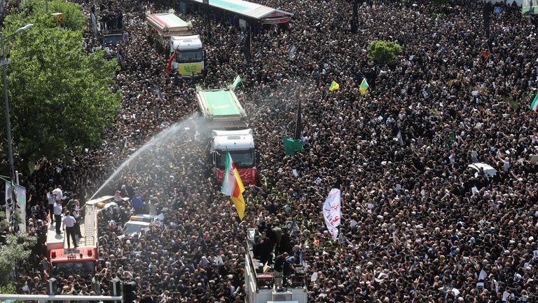 Mourners attend the funeral for victims of helicopter crash that killed Iran&#39;s President Ebrahim Raisi, Foreign Minister Hossein Amirabdollahian and others, in Tehran.
Pic: WANA/Reuters