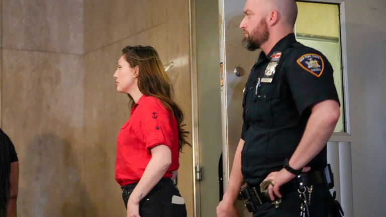 Jessica Mann, left, leaves Manhattan Criminal Court after a hearing for Harvey Weinstein, Wednesday, May 1, 2024, in New York.  Mann accused Weinstein of sexual assault.  (AP Photo/Mary Altaffer)
