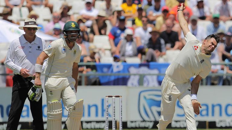 England bowler Jimmy Anderson in action while South Africa's batsman Dean Elgar watches on during day two of the second cricket test between South Africa and England at the Newlands Cricket Stadium in Cape Town, South Africa, Saturday Jan. 4, 2020. (AP Photo/Halden Krog)


