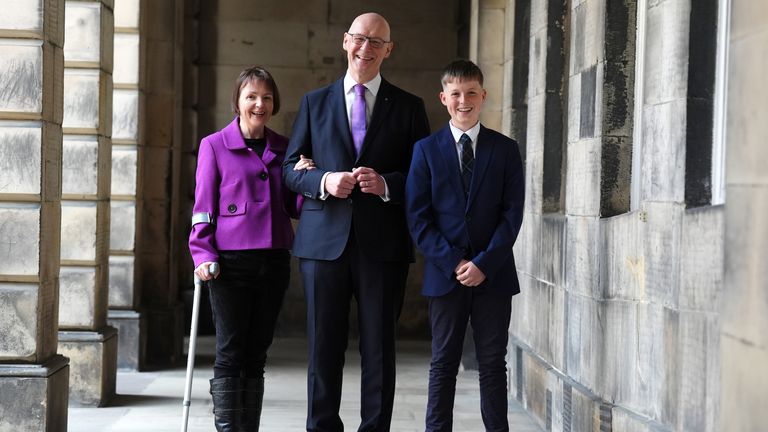 John Swinney poses for a photograph with his wife Elizabeth Quigley and son Matthew, 13, after he was sworn in as First Minister of Scotland and Keeper of the Scottish Seal, at the Court of Session in Edinburgh. Picture date: Wednesday May 8, 2024.