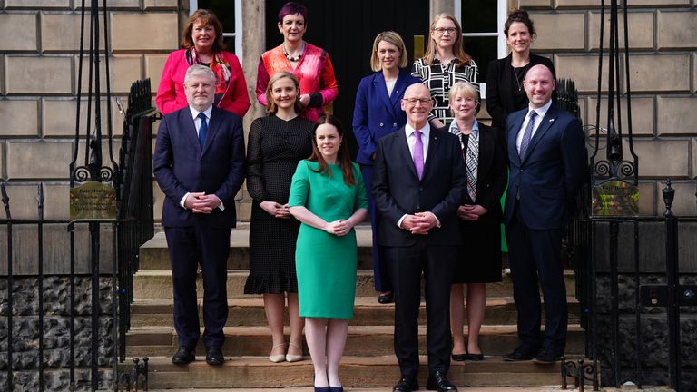 Newly appointed First Minister of Scotland John Swinney stands with his newly appointed Cabinet members (top row - left to right)Fiona Hislop, Angela Constance, Jenny Gilruth, Shirley-Anne Somerville and Mairi Gougeon, (front row left to right) Angus Robertson, Mairi McAllan, Kate Forbes, John Swinney, Shona Robison and Neil Gray, on the steps of Bute House, Edinburgh. Picture date: Wednesday May 8, 2024.