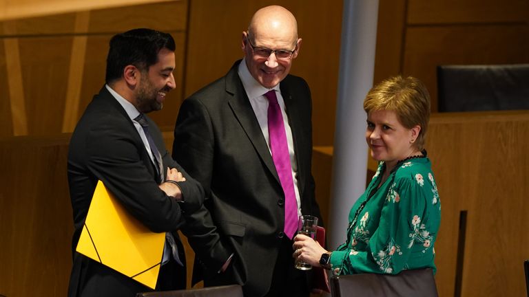 Newly elected leader of the SNP John Swinney, with outgoing FM Humza Yousaf and former FM Nicola Sturgeon. Pic: PA