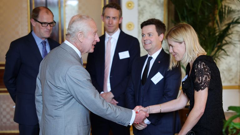 King Charles meets Declan Donnelly and Ali Astall during a reception for Prince&#39;s Trust Award 2024.
Pic: PA